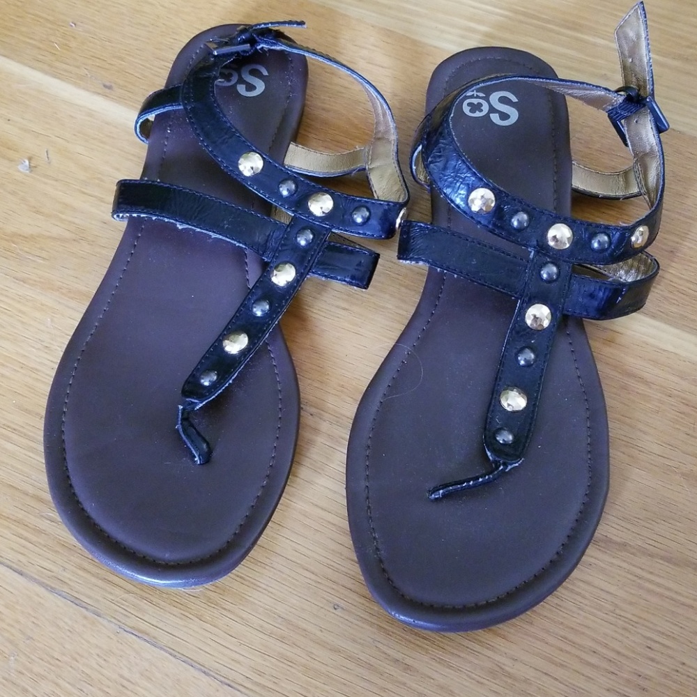 Black studded gladiators
